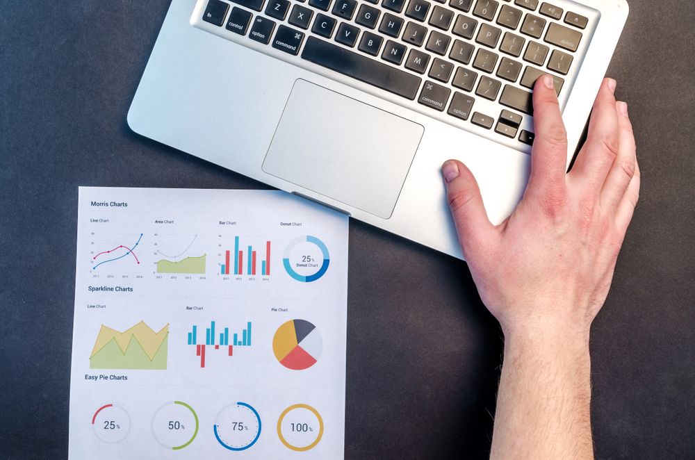 Analytics dashboard on a warm wooden desk